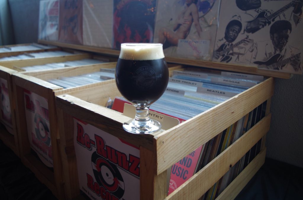 Gotta love sippin’ on Liquid Vinyl Black IPA while perusing records#brokenstrin…