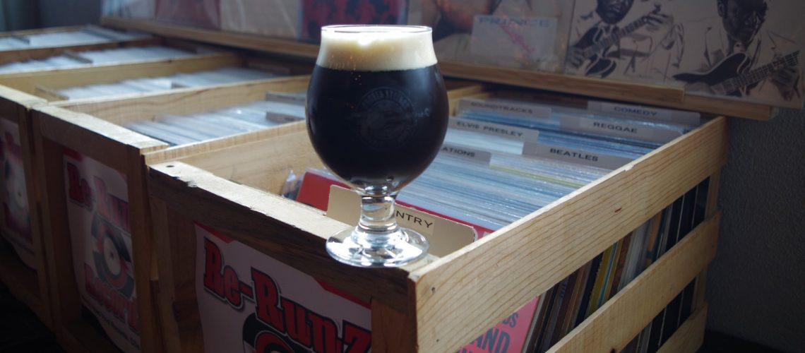 Gotta love sippin’ on Liquid Vinyl Black IPA while perusing records#brokenstrin…